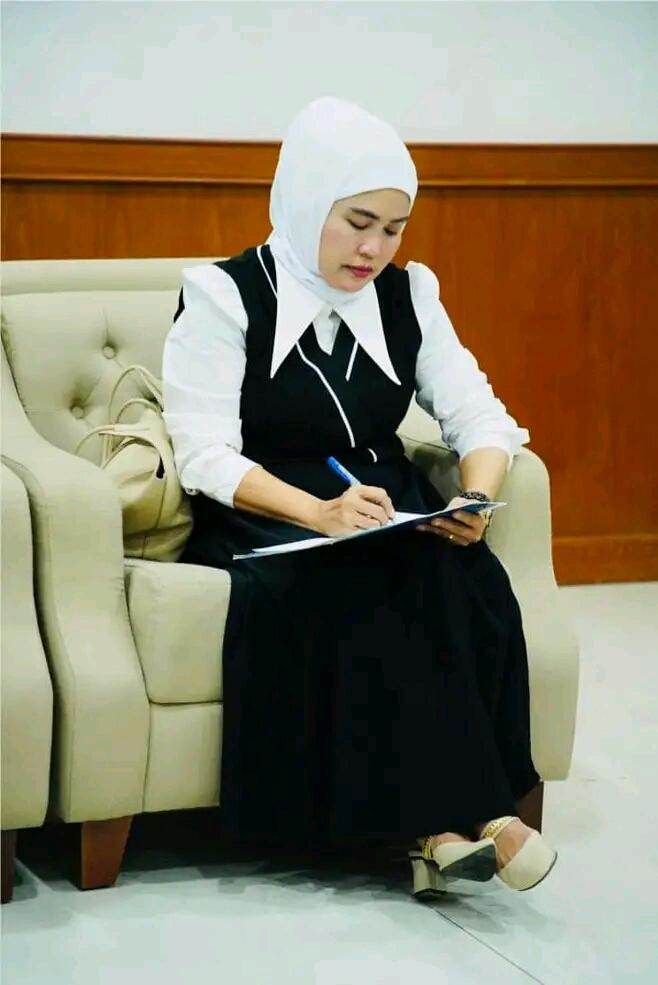 Hj. Sumiartini (Utet) 